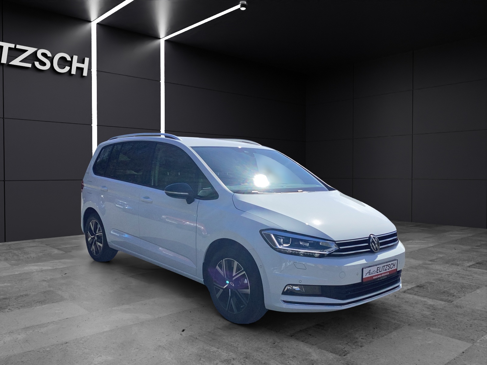 Fahrzeugabbildung Volkswagen Touran TSI Comfortline DSG LED AHK Navi AID ACC RFK SH