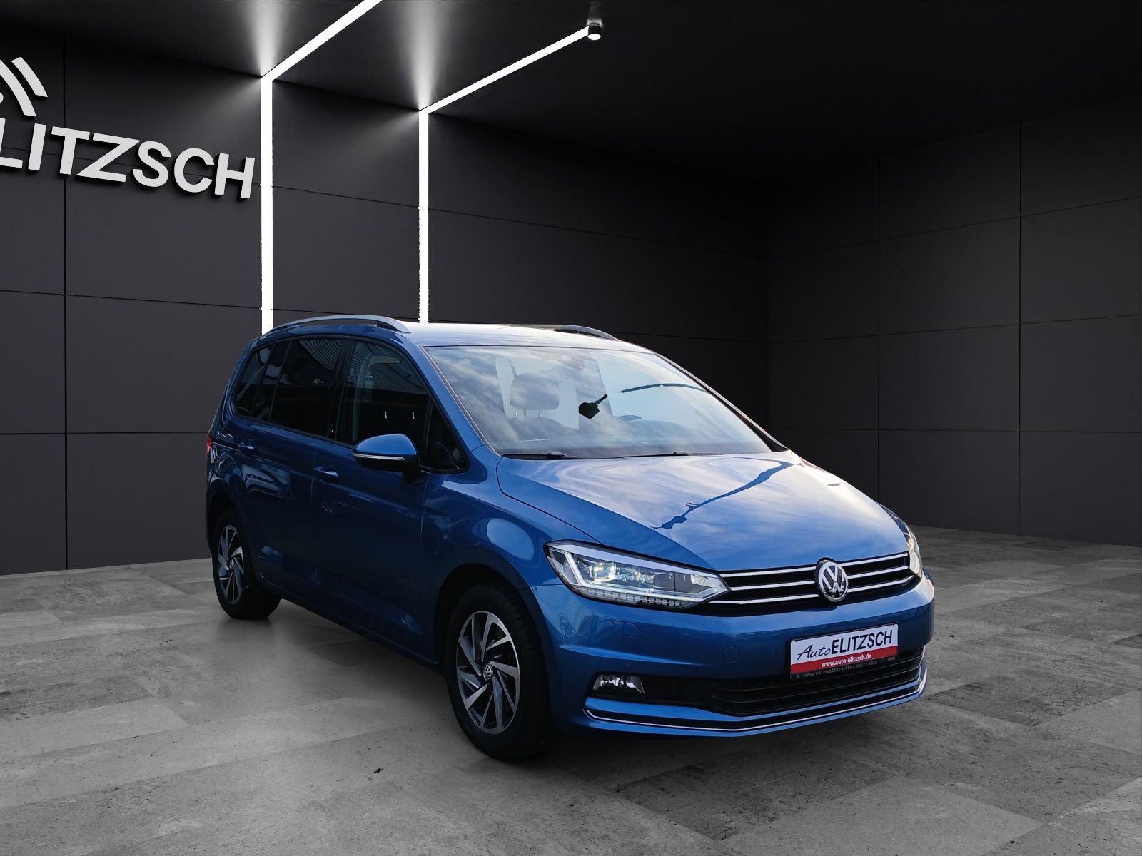 Fahrzeugabbildung Volkswagen Touran TSI Sound DSG LED AHK Navi ACC PDC SH